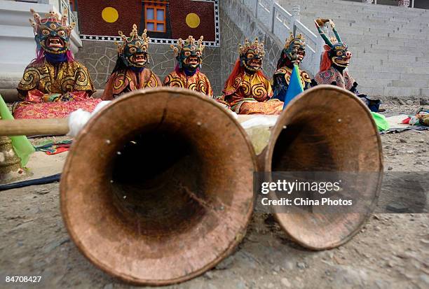 Lamas attend the "Tiaoqian" praying ceremony at the Youning Temple on February 8, 2009 in Huzhu County of Qinghai Province, China. The Youning Temple...