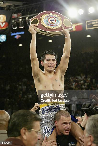 Marco Antonio Barrera celebrates his victory over Erik Morales during their World Featherweight Championship fight on June 22, 2002 at the MGM Grand...