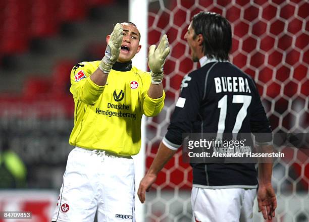 Luis Robles of Kaiserslautern reacts with his team mate Alexander Bugera during the Second Bundesliga match between 1. FC Nuernberg and 1. FC...