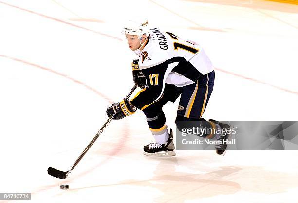 Marc-Andre Gragnani of the Buffalo Sabres skates the puck up ice against the Phoenix Coyotes on January 31, 2009 at Jobing.com Arena in Glendale,...
