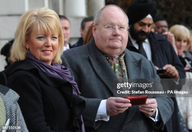 Baroness Helen Newlove and Communities Secretray Eric Pickles watch The Royal British Legion Youth Band march through Horse guards Parade in London...