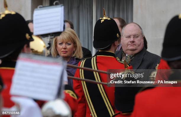 Baroness Helen Newlove and Communities Secretray Eric Pickles watch The Royal British Legion Youth Band march through Horse guards Parade in London...