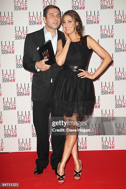 David Walliams and Lisa Snowdon pose in the press room after accepting the best music award on behalf of the Kings Of Leon at The Elle Style Awards...