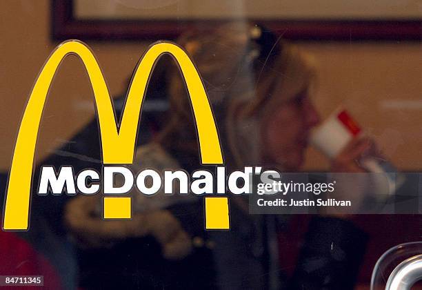 McDonald's customer is seen through the window at a McDonald's restaurant February 9, 2009 in San Francisco, California. Fast food chain restaurant...