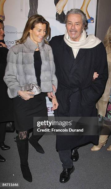 Alain Delon and Valerie Hortefeux attend "Le Code Change" Paris premiere on February 9, 2009 in Paris, France.