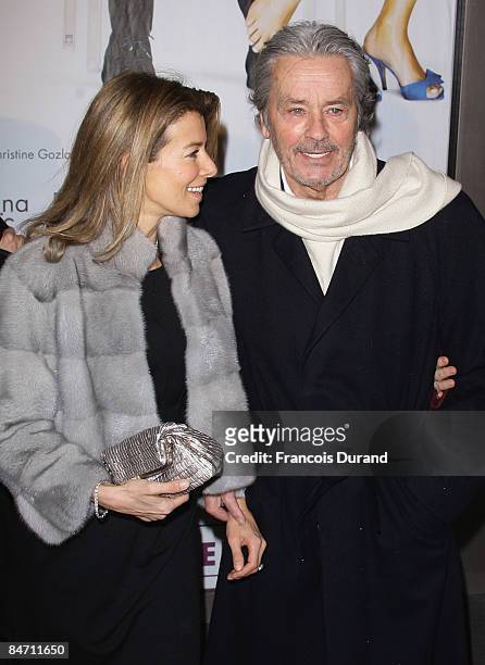 Alain Delon and Valerie Hortefeux attend "Le Code Change" Paris premiere on February 9, 2009 in Paris, France.