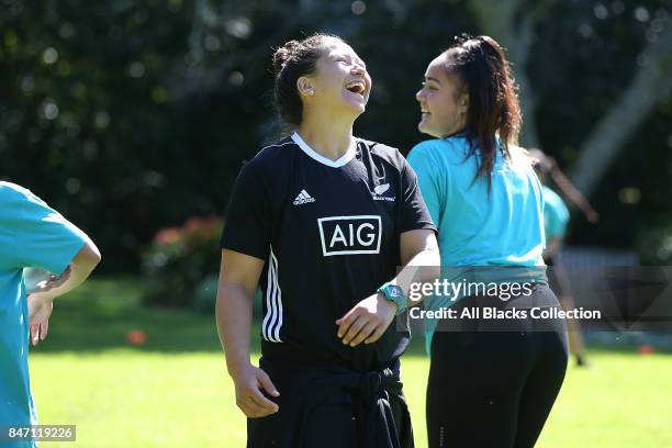 Charmaine McMenamin of the Black Ferns coaches students during a meet and greet with the Governor General at Government House on September 15, 2017...