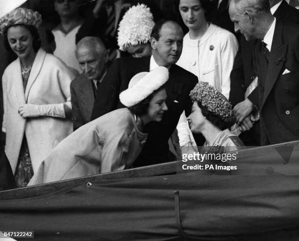 *Scanned low-res from print* Queen Elizabeth II and Princess Margaret watching the Men's singles final at Wimbledon. Behind, left, is Field-Marshal...