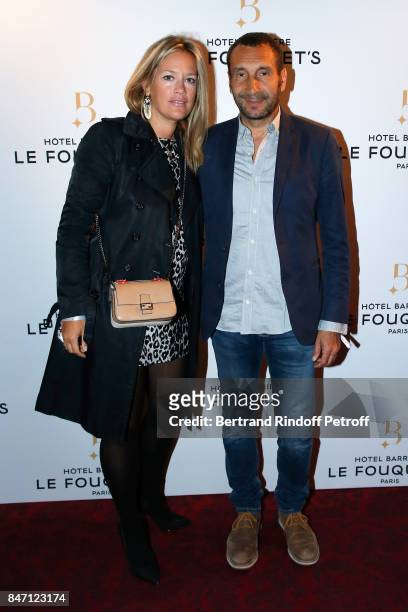 Painter Caroline Faindt and her companion actor Zinedine Soualem attend the Reopening of the Barriere Hotel "The Fouquet's", decorated by Jacques...