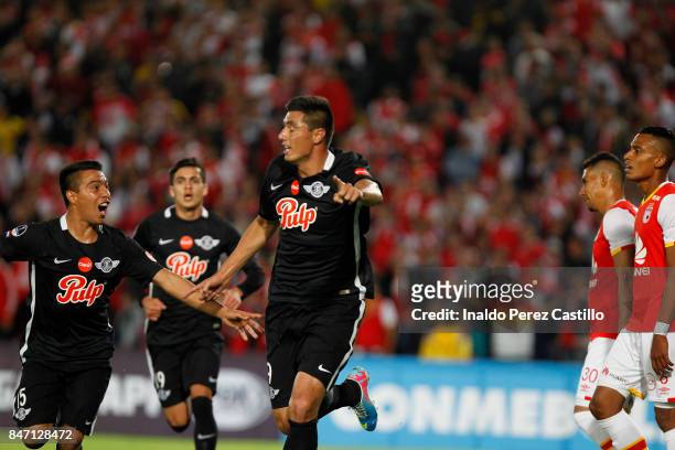 Oscar Cardozo of Libertad celebrates after scoring the first goal of his team during a second leg match between Independiente Santa Fe and Libertad...