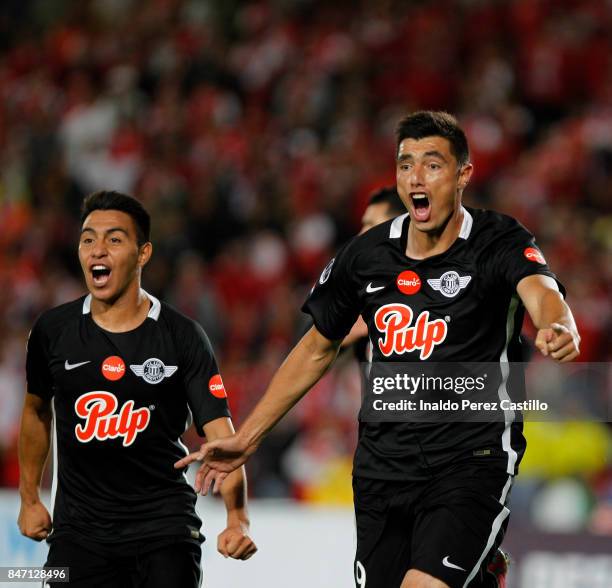 Oscar Cardozo of Libertad celebrates after scoring the first goal of his team during a second leg match between Independiente Santa Fe and Libertad...