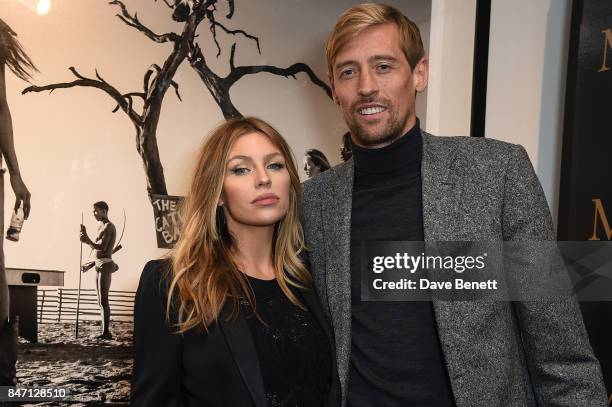 Abbey Clancy and Peter Crouch attend the private view of leading wildlife photographer, David Yarrow's exhibition at Maddox Gallery Westbourne Grove,...