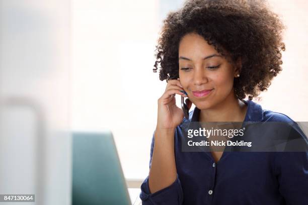 corporate lifestyle 41 - curly hair woman white shirt stock pictures, royalty-free photos & images