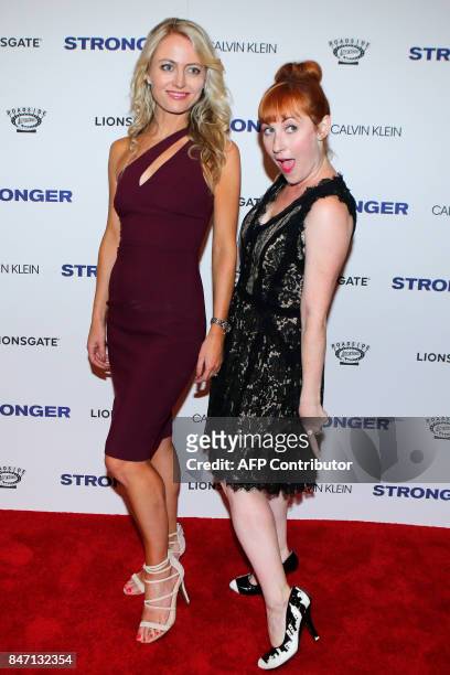 Amy Rutberg and a guest pose as they attend the 'Stronger' New York Premiere at Walter Reade Theater on September 14, 2017 in New York City. / AFP...