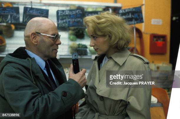 Dominique Zardi et Pauline Lafont sur le tournage du film 'Le Pactole' de Jean-Pierre Mocky en fevrier 1985 en France.