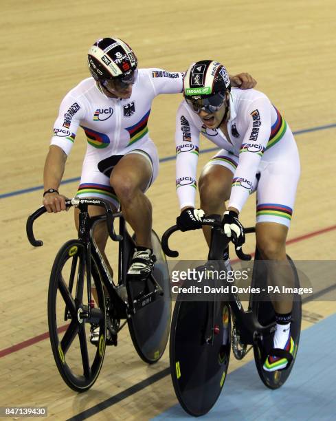 Germany's Rene Enders and Maximilian Levy celebrate gold in the Men's Team Sprint Final during day one the UCI Track Cycling World Cup at the...