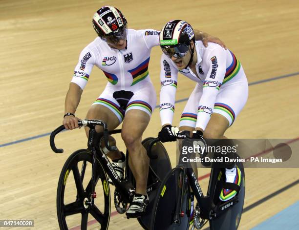 Germany's Rene Enders and Maximlian Levy celebrate winning gold in the Men's Team Sprint Final during day one the UCI Track Cycling World Cup at the...
