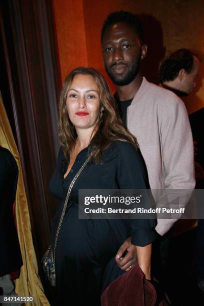 Humorist Thomas N'Gijol and his wife actress Karole Rocher attend the Reopening of the Hotel Barriere Le Fouquet's Paris, decorated by Jacques...