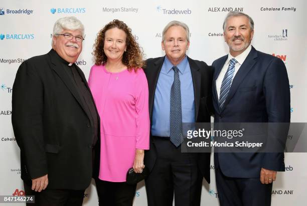 Rev. Kevin Smith, Margot Coleman, Roger Coleman and Michael Balboni attend Tuesday's Children Rise Up For Resilience Gala at Gustavino's on September...