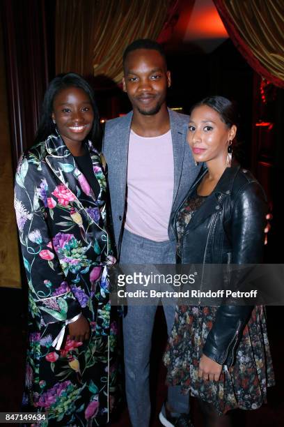 Karidja Toure, Ahmed Drame and his companion Eva attend the Reopening of the Hotel Barriere Le Fouquet's Paris, decorated by Jacques Garcia, at Hotel...