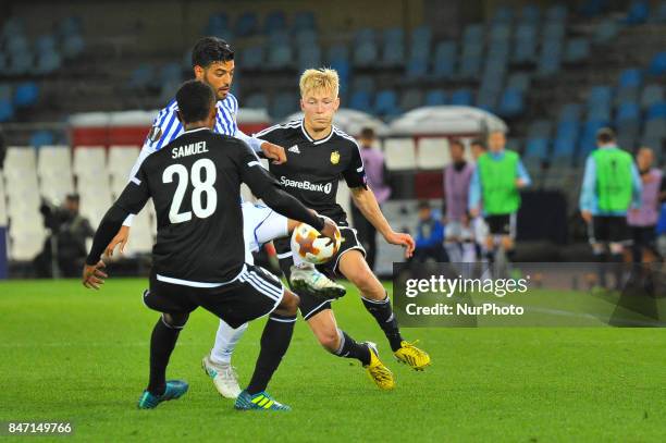 Carlos Vela of Real Sociedad reacts Alex Gersbach and Birger Meling of Rosenborg BK during the UEFA Europa League Group L football match between Real...