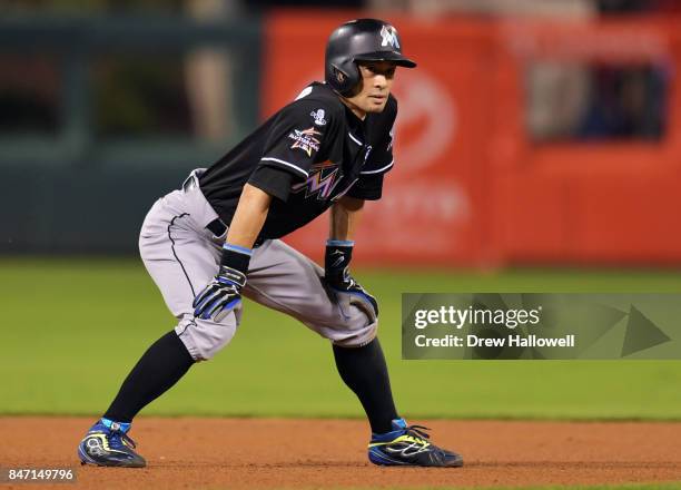 Ichiro Suzuki of the Miami Marlins takes a lead from second base in the seventh inning against the Philadelphia Phillies at Citizens Bank Park on...