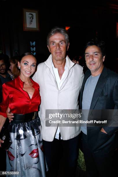 Of Hotel Barriere Dominique Desseigne standing between his companion Dancer Alexandra Cardinale and actor Yvan Attal attend the Reopening of the...