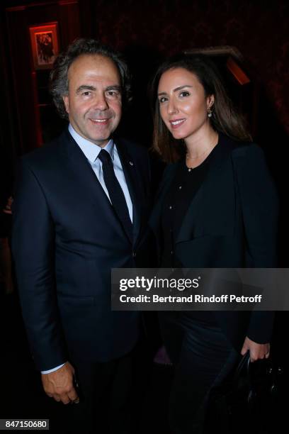 Politician Luc Chatel and Mahnaz Hatami attend the Reopening of the Hotel Barriere Le Fouquet's Paris, decorated by Jacques Garcia, at Hotel Barriere...