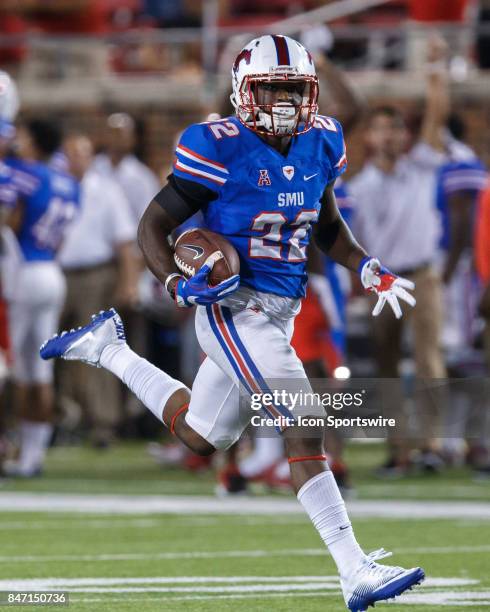 Mustangs wide receiver Myron Gailliard runs up field for a touchdown after a catch during the college football game between the SMU Mustangs and the...