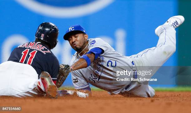 Jose Ramirez of the Cleveland Indians is safe at second base with a double as Alcides Escobar of the Kansas City Royals attempts the tag during the...