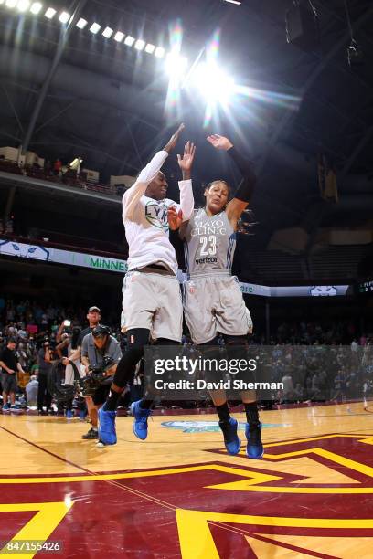 Maya Moore of the Minnesota Lynx and Natasha Howard of the Minnesota Lynx shoulder bump after the game against the Washington Mystics in Game Two of...