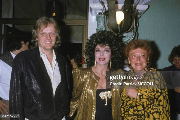 Peter Holm, Joan Collins and Regine at party on May 3, 1986 in Saint Tropez, France. France.