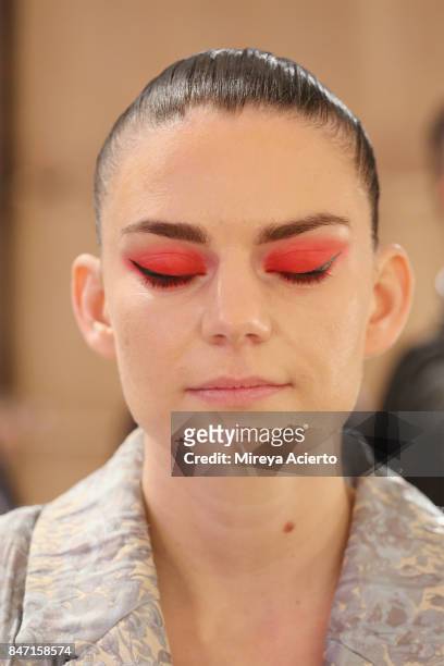Singer Frida Sundemo prepares backstage at the Livari By Alysia Reiner, Claudine De Sola & Tabitha St. Bernard-Jacobs fashion show during New York...