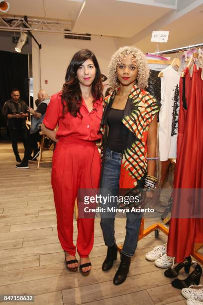 Fashion designers Claudine De Sola and Tabitha St. Bernard-Jacobs pose backstage at the Livari By Alysia Reiner, Claudine De Sola & Tabitha St....