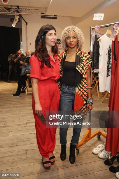 Fashion designers Claudine De Sola and Tabitha St. Bernard-Jacobs pose backstage at the Livari By Alysia Reiner, Claudine De Sola & Tabitha St....