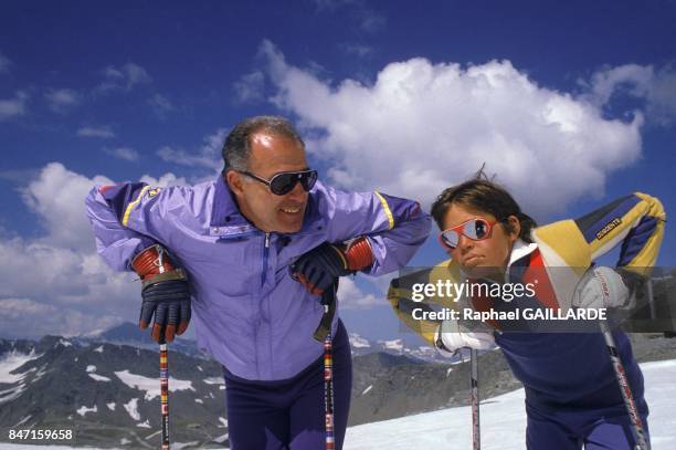 Alphonse, Duke of Anjou, with his son Louis XX at Val d'Isère ski resort on July 28, 1986 in Val d'Isère, France.