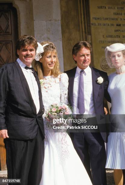 American actor Michael Douglas and wife Diandra, right, attend the wedding of Joel Douglas on September 11, 1986 in Nice, France.
