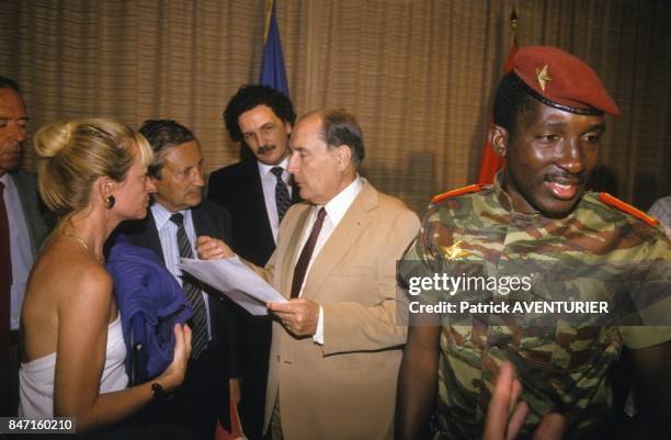 French President Francois Mitterrand with Thomas Sankara, President of Burkina Faso, and his son Jean-Christophe Mitterrand, advisor on African...