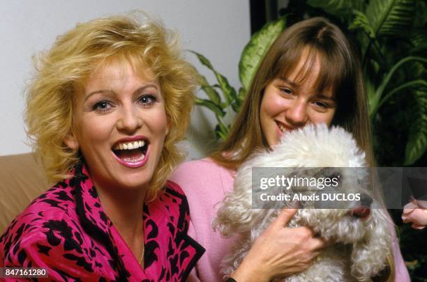 Presenter Evelyne Leclercq with daughter Celine on March 23, 1990 in France.