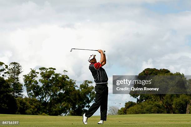 Cameron Percy of Australia plays an approach shot on the eighth hole during the Australasia International Final Qualifying for The 2009 Open...