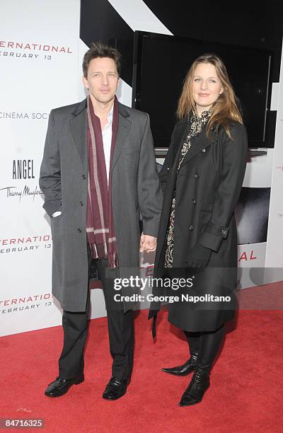 Actor Andrew McCarthy and wife Carol Schneider attend the Cinema Society and Angel by Thierry Mugler screening of "The International" at AMC Lincoln...