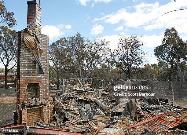 The chimney of a property is the only thing left standing after it was burnt to the ground following the devastating bush fires on February 10, 2009...