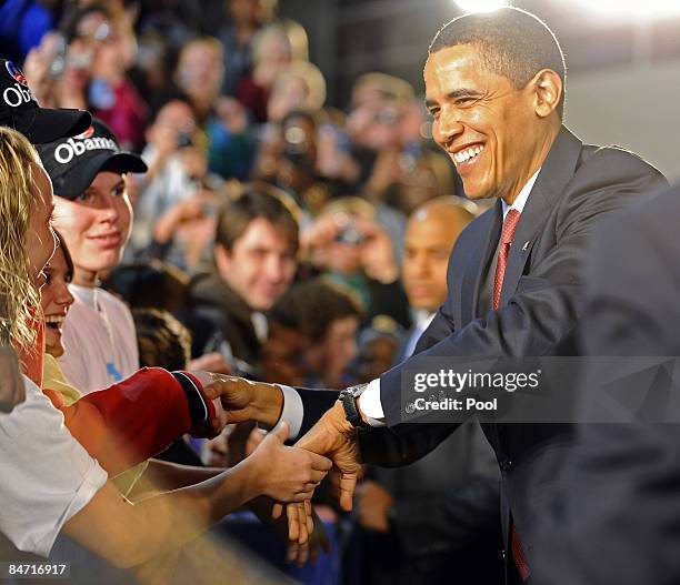 President Barack Obama shakes hands with well-wishers at a town hall meeting February 9, 2009 in Elkhart, Indiana, Obama was seeking public support...