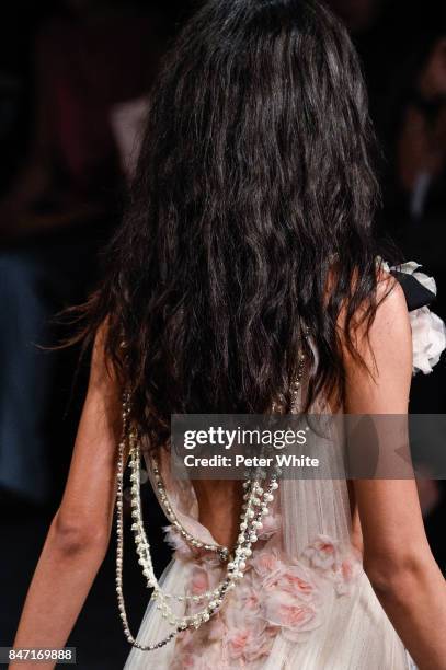 Model, jewelry detail, walks the runway at Marchesa Spring 2018 during New York Fashion Week at Gallery 1, Skylight Clarkson Sq on September 13, 2017...