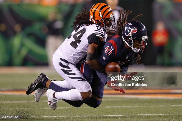 Adam Jones of the Cincinnati Bengals breaks up a pass intended for DeAndre Hopkins of the Houston Texans during the second half at Paul Brown Stadium...