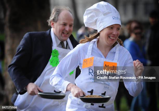 Lord Redesdale and Tracey Crouch MP take part in the annual Parliamentary Pancake Race in Westminster today raising money for the charity Rehab.