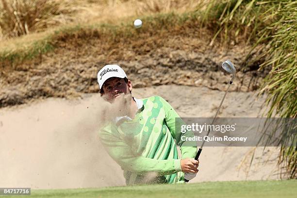 Josh Geary of New Zealand plays out of the bunker on the thirteenth hole during the Australasia International Final Qualifying for The 2009 Open...