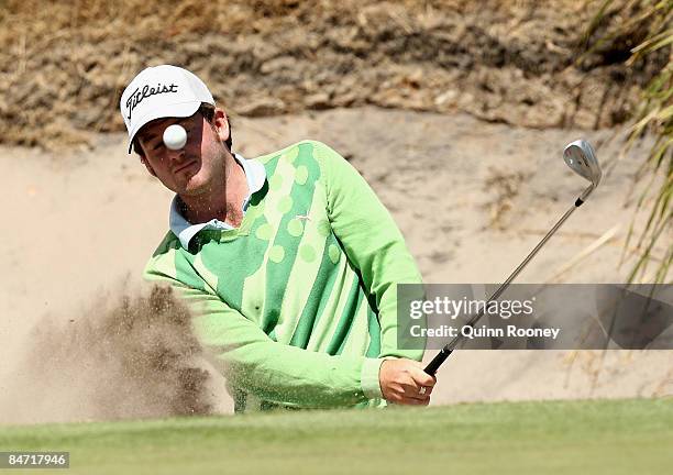 Josh Geary of New Zealand plays out of the bunker on the thirteenth hole during the Australasia International Final Qualifying for The 2009 Open...
