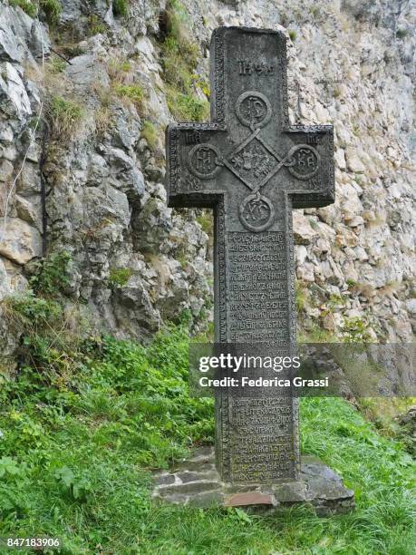 holy cross outside dracula castle in bran, transylvania, romania - bran castle stock pictures, royalty-free photos & images