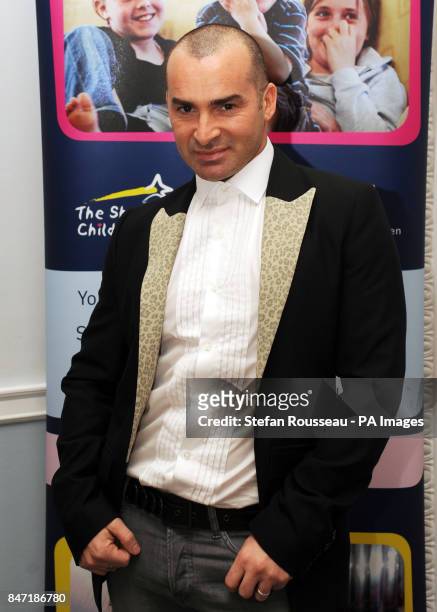 Reality TV judge, Louie Spence attends a tea party in aid of the children's hospice charity Shooting Star Chase at the Dorchester Hotel in London...